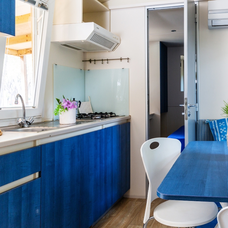 Zona giorno con angolo cottura