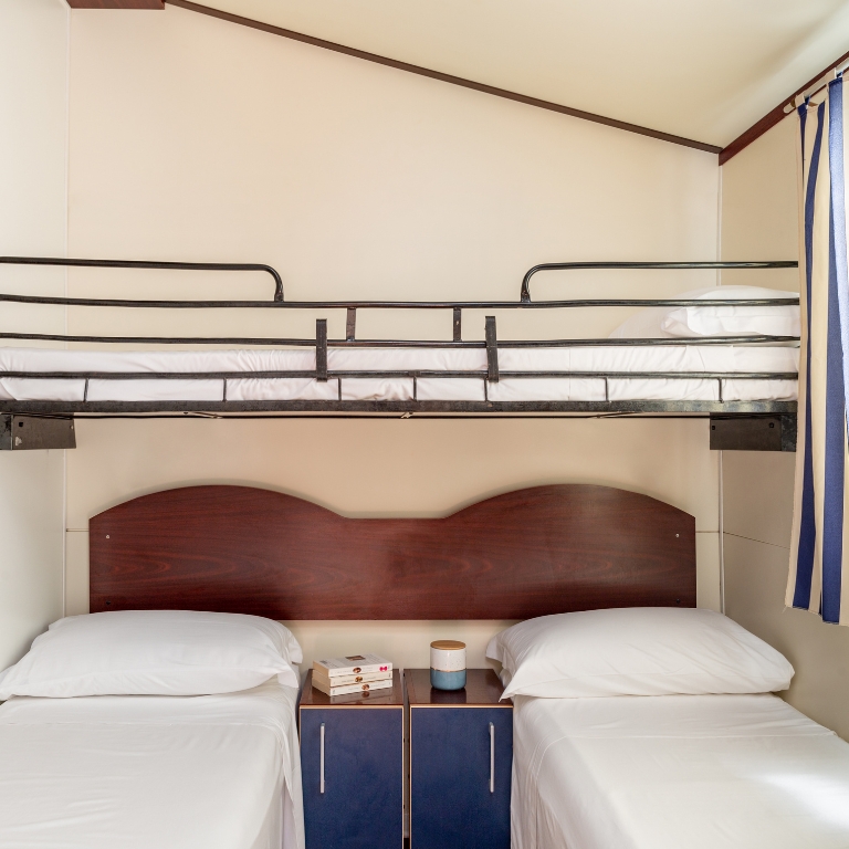 Bedroom with three single beds